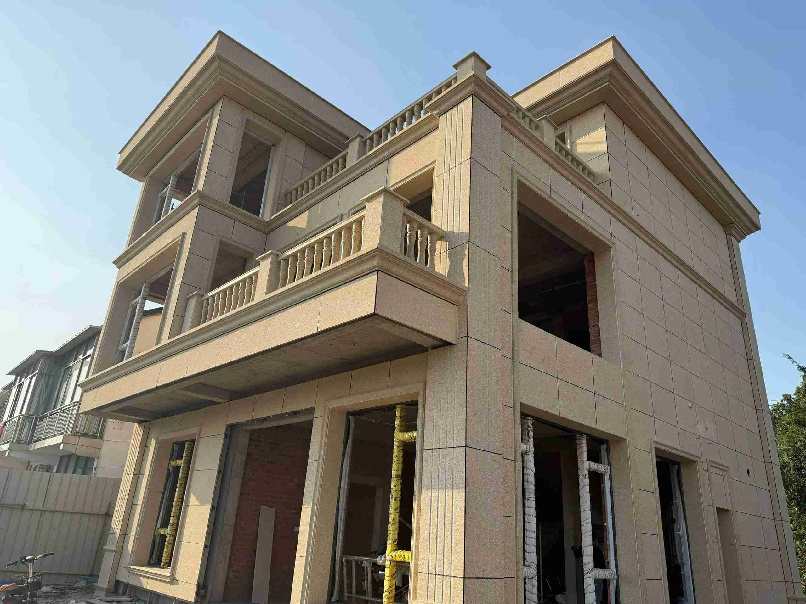 宁德 黄金麻花岗岩石材荔枝面外墙干挂效果展示